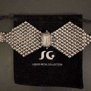Sergio Gutierrez Liquid Metal Bracelet w/ Swarovski Crystal & orig. bag. NWOT.